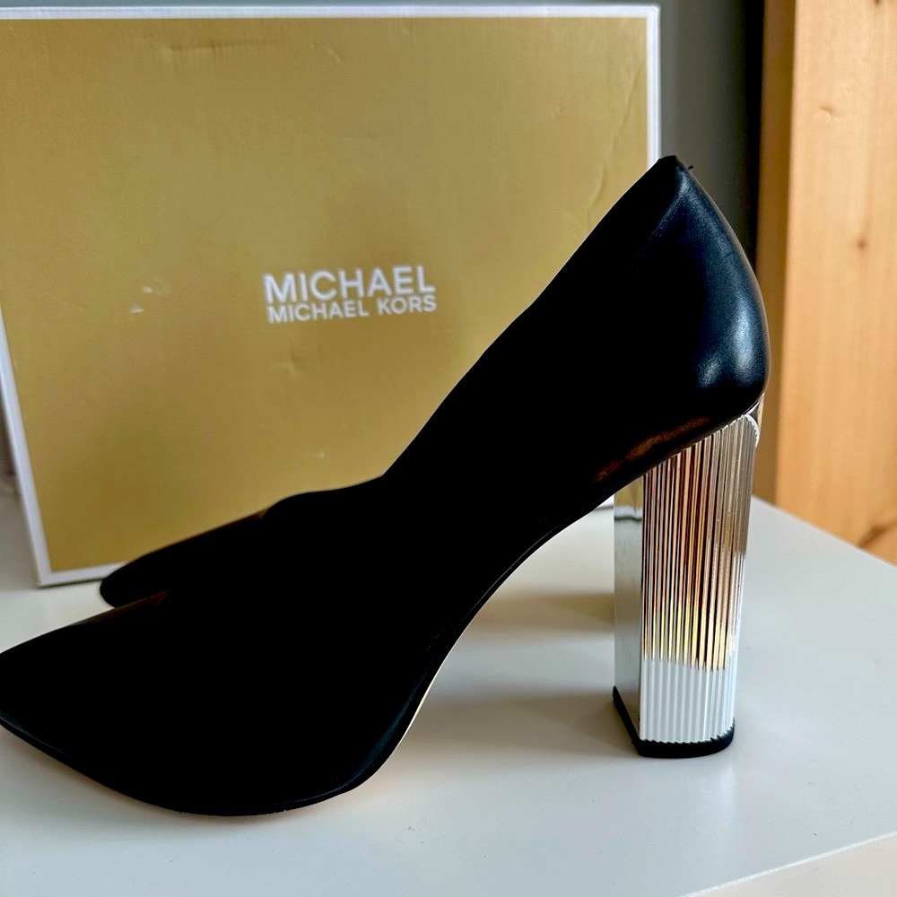 MICHAEL KORS Women’s Black Leather with Silver Metallic Heels.